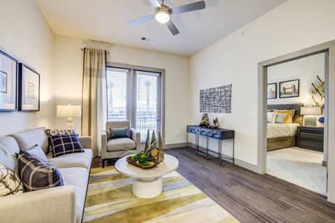 Cromwell at Plum Creek Apartments Model Living Room and Bedroom